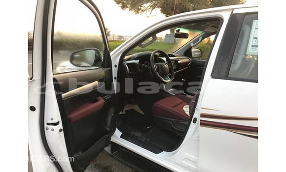 Buy Import Toyota Hilux White Car in Import - Dubai in Central Buy Import Toyota Hilux White Car in Import - Dubai in Central