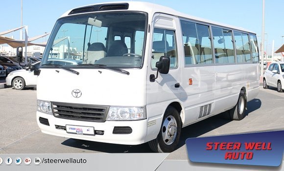 Acheter Import Voiture Toyota Coaster Blanc à Import - Dubai, Central Acheter Import Voiture Toyota Coaster Blanc à Import - Dubai, Central