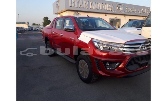Buy Import Toyota Hilux Red Car in Import - Dubai in Central Buy Import Toyota Hilux Red Car in Import - Dubai in Central