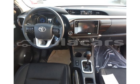 Buy Import Toyota Hilux Red Car in Import - Dubai in Central Buy Import Toyota Hilux Red Car in Import - Dubai in Central