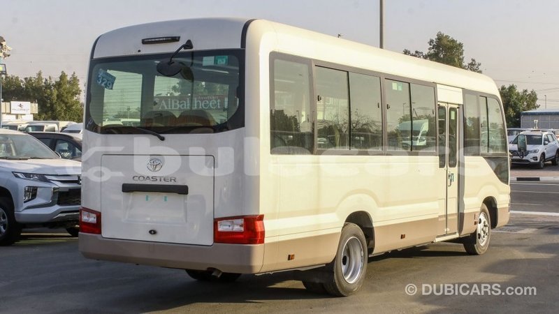 Big with watermark toyota coaster central import dubai 6649