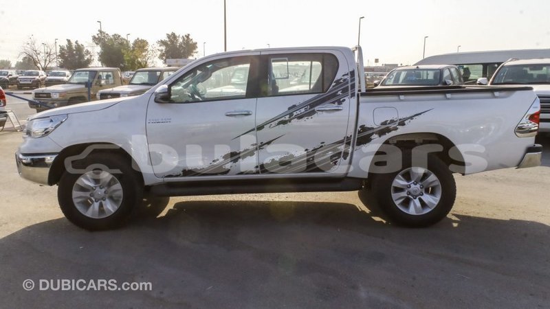 Big with watermark toyota hilux central import dubai 6653