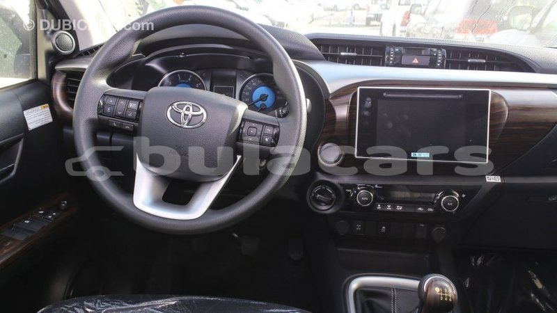 Big with watermark toyota hilux central import dubai 6658