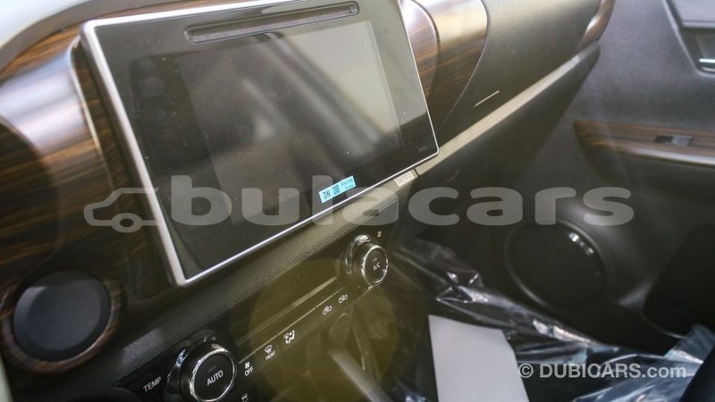 Big with watermark toyota hilux central import dubai 6658