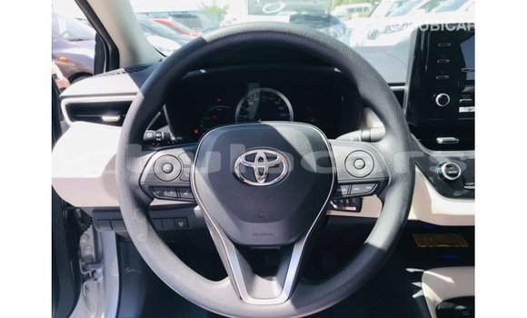 Buy Import Toyota Corolla White Car in Import - Dubai in Central Buy Import Toyota Corolla White Car in Import - Dubai in Central