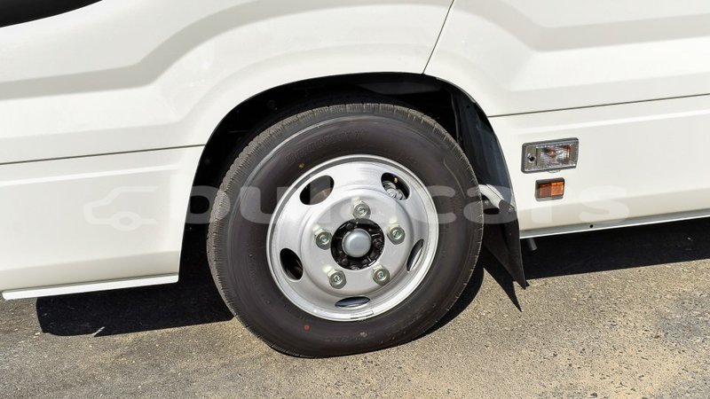 Big with watermark toyota coaster central import dubai 6860