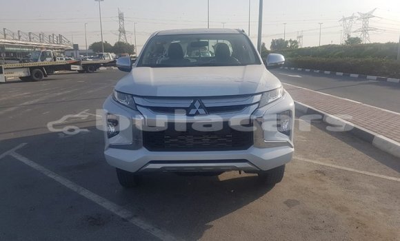 Buy Import Mitsubishi L200 White Car in Import - Dubai in Central